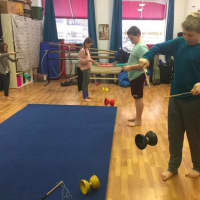 <p>Kids have a great time practicing their circus skills</p>