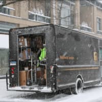 <p>A UPS delivery truck making its way through the snow on Greenwich Avenue during Thursday&#x27;s snowstorm</p>