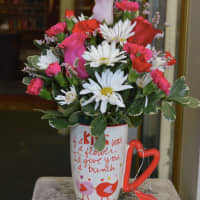 <p>Valentine&#x27;s Day flowers in a mug</p>