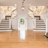 <p>The home has a fabulous entry way.</p>