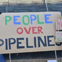 <p>Marchers protest local banks in Stamford who are helping to fund the pipeline.</p>
