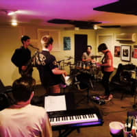<p>Students practicing at the Music Shed in Redding</p>