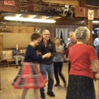 <p>Dot and Weber Perpignand having fun at a student dance at the Powdermill Barn in Hazardville, put on by the South Windsor Square Dance Club.</p>