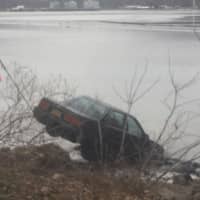 <p>The car being pulled from the water under the Jan Peeck Bridge near the Annesville  Circle in Peekskill.</p>