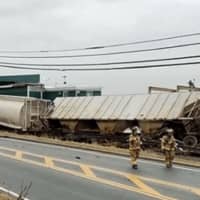 <p>Freight train cars off the tracks in Newburgh on Tuesday.</p>