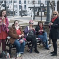 <p>A handful of women talk, laugh and crochete pink pussy hats -- a trademark accessory of the Women&#x27;s March  -- on Wednesday afternoon in the Bethel Library Courtyard.</p>
