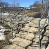 <p>The pedestrian bridge at Scalzi Park where a man swung a knife at a 24-year-old woman Tuesday evening in a random attack. She was uninjured and he was arrested.</p>