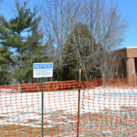<p>The lot at 28 Catoonah St. in Ridgefield, where the former Cumming house was torn down, stands empty.</p>