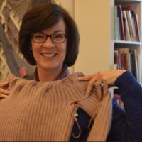 <p>Beth Dull is knitting a wool cashmere sweater for herself</p>