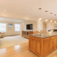 <p>The open kitchen and living area is deigned for year-round livability.</p>