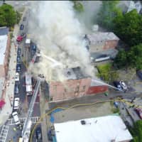 <p>An aerial view of the blaze on East Main Street in Wappingers Falls.</p>