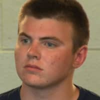 <p>Christopher Barlow Jr. is a student at Sacred Heart University and a former EMT in Easton. He was arrested Monday in Massachusetts on weapons charges.</p>