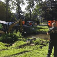<p>Greenwich police continue to look for evidence Thursday in the pond at Binney Park as the investigation continues into skeletal remains that were found there this past spring.</p>