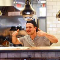 <p>Tinari works in the kitchen at Bing&#x27;s Burgers in Fort Lee.</p>