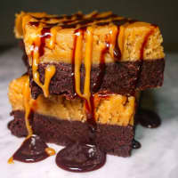 <p>Chocolate Peanut Butter Bars with a caramel and chocolate drizzle from Marc&#x27;s Cheesecake in Glen Rock.</p>