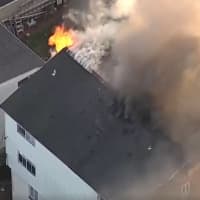 <p>Two houses are burning on Alden Street, right next to Stamford Hospital, early Monday evening. It is a two-alarm fire for Stamford firefighters.</p>