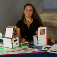 <p>Ayana Klein, pictured, and her brother Ethan are selling architectural kits through 3Dux/Design.</p>