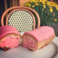 <p>Pink eclairs at Bistro Versailles in Greenwich (only available in October in honor of Breast Cancer Awareness month).</p>