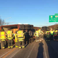 <p>The Danbury Fire Department is on the scene of an overturned tractor-trailer that is blocking two lanes of I-84 between Exits 3 and 2 on Monday morning.</p>