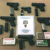 <p>A search of a Bridgeport &quot;stash house&quot; on Fourth Street turned up six illegal firearms — four of which were stolen, police said.</p>