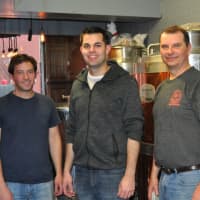 <p>Left to right: Adam Letize, Shane Nunes and John Commander are the head brewers at Iron Brewing Company in South Norwalk.</p>