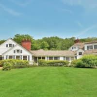 <p>2 Day Road in Armonk sits on three acres, which include a skating pond.</p>
