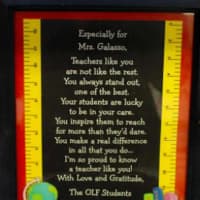 <p>Students at Our Lady of Fatima School presented Geri Galasso with this framed poem.</p>