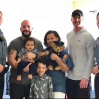 <p>The Garcia family with the officers who helped deliver baby Lyon Judah.</p>