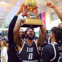 <p>Joel Hernandez of Teaneck celebrates after shocking Wagner last week to win the NEC title. LIU lost to Radford Tuesday night.</p>