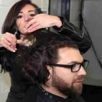 <p>New Rochelle High School Coach Paul Viggiano donated his ponytail to Locks of Love to honor his mother who died of lung cancer.</p>