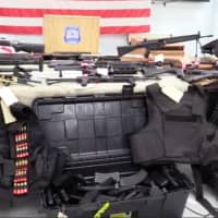 <p>A look at the firearms discovered by police in a welfare check Saturday night on 32-year-old Robert Csak.</p>