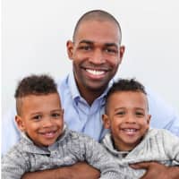 <p>Antonio Delgado of Rhinebeck (shown here with his sons Maxwell and Coltrane) is one of seven Democratic candidates seeking to oust U.S. Rep. John Faso in the fall election.</p>