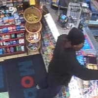 <p>New York State Police investigators have released surveillance photos of a suspect implicated in an armed robbery at a Cortlandt gas station.</p>