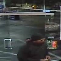 <p>New York State Police investigators have released surveillance photos of a suspect implicated in an armed robbery at a Cortlandt gas station.</p>
