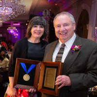 <p>Dr. Mary Leahy, chief executive officer of Bon Secours Charity Health System and Trans Group Owner and President John Corr.</p>
