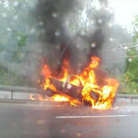 <p>A pickup truck was fully engulfed in flames at the Saw Mill Parkway/I-684 merger on Thursday morning.</p>