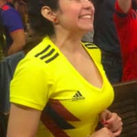 <p>A fan waits anxiously as her team gets closer to a win.</p>