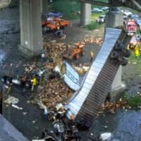 <p>The aftermath of the June 28, 1983, collapse of part of the Mianus River Bridge along I-95 in Greenwich.</p>
