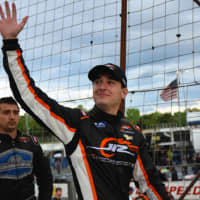 <p>Ridgefield native Anthony Alfredo after a recent top-10 racing finish.</p>