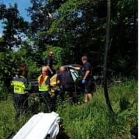 <p>The driver of the single-car crash is extricated from the vehicle.</p>