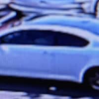 <p>Investigators released surveillance photos of the suspect and the burglarized vehicle in Norwalk.</p>