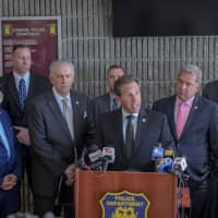 <p>Officials announcing the arrests in Yonkers.</p>