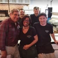 <p>Dan Lauria poses with staffers at Frank Pepe&#x27;s Pizzeria in New Haven earlier this month.</p>
