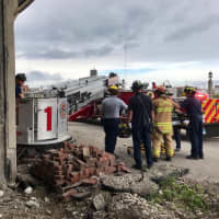 <p>First responders helped rescue a worker who was injured during demolition efforts at 860 Canal St. in Stamford.</p>