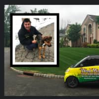 <p>Weed Man Lawn Care owner Joseph Dillon with puppy Kona.</p>