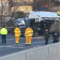 <p>A tractor-trailer overturned on Route 495 westbound Wednesday morning.</p>