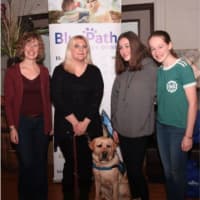 <p>BluePath Service Dogs is looking for foster families to care for future autism service dogs (L-R) Jean Marie Trick, Jen Cavanagh (Sonny’s new mom), Trick’s daughters and BluePath Sonny</p>