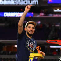 <p>Former Westchester high school basketball star Ty Jerome cutting down the nets after winning the NCAA Championship.</p>