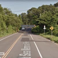 <p>A driver lost the top of his truck after his vehicle clipped the bottom of a railroad bridge in East Hampton.</p>
