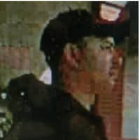 <p>The man pictured here is believed to have followed a victim, and captured several photographs up the victim’s skirt, police said.</p>